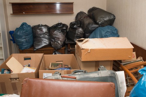 Client consulting with loft clearance experts